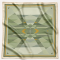 Silent Compass silk scarf by Glyph, featuring a geometric design in sage green, olive, cream and gold tones.